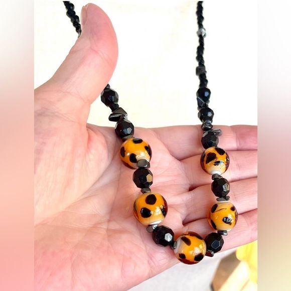 Leopard print glass bead and hematite necklace 29 1/2” + 2 1/2” - Picture 3 of 9